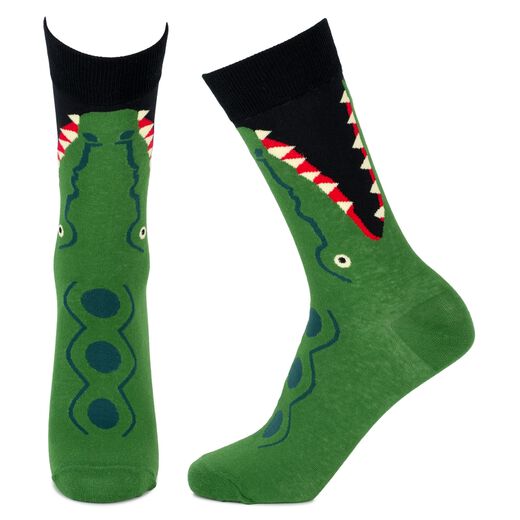 A pair of socks featuring a print of a green crocodile.