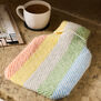 Rainbow stripe wool hot water bottle cover