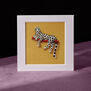 Design for a panther on a branch brooch &ndash; 8 x 8 mounted print