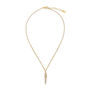 A gold chain necklace with a crystal pendant in the shape of a long pointy leaf.