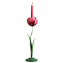 A green and pink candlestick in the form of a spring tulip. A pink candle is placed on its top.