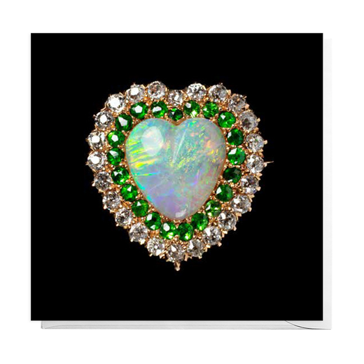 Pack of 8 Christmas cards featuring the caption of a heart shaped emerald brooch from the V&A collection