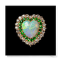 Pack of 8 Christmas cards featuring the caption of a heart shaped emerald brooch from the V&A collection