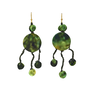 A pair of green hook earrings are made using silk offcuts.