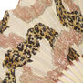 Close up of a paper hand fan featuring a pattern with pink lace and leopard printed ribbons.