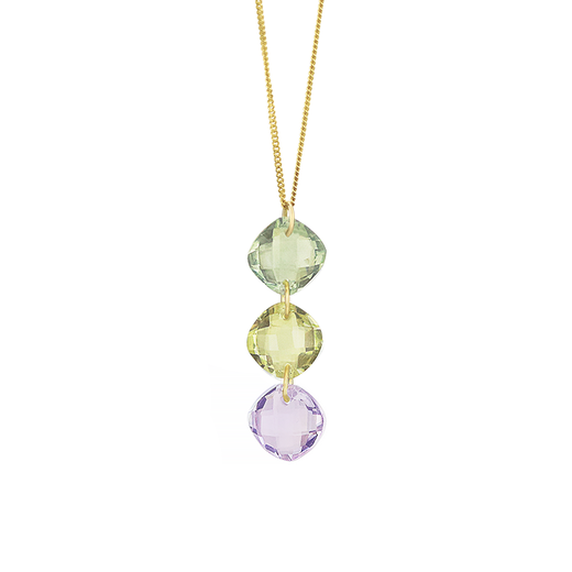 A gold chain necklace with a pendant featuring three pastel green and lilac cushion cut stones.