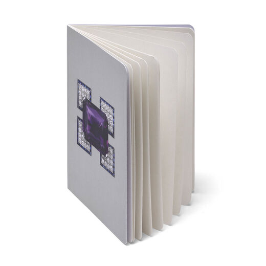 Inner pages are blank off-white paper