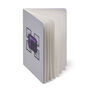 Inner pages are blank off-white paper