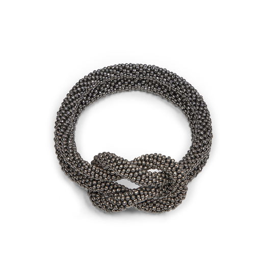 Silver tones knot bracelet with pote glass beads