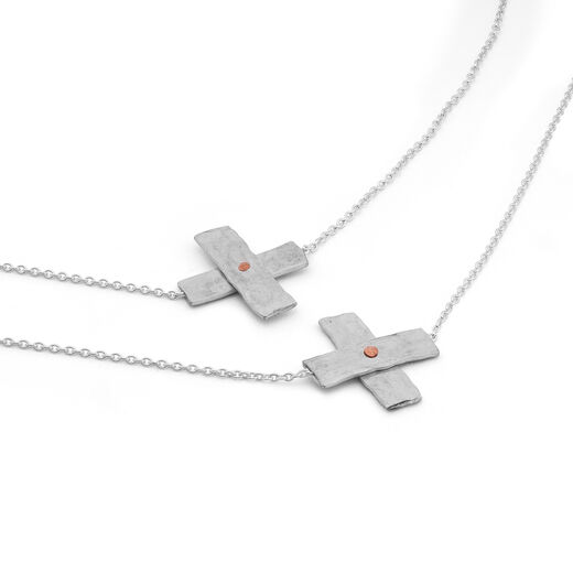 Long mixed metal necklace by Kate Trouw