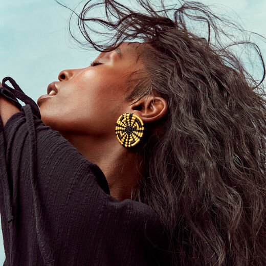 Black and gold colour twist stud earrings by Inzuki