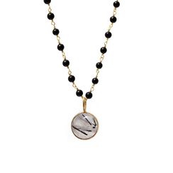 Rutilated quartz and black onyx rosary necklace by Mirabelle