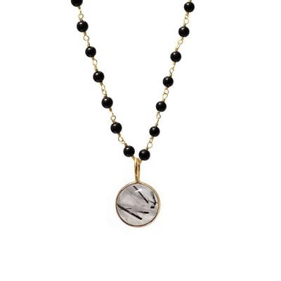 Rutilated quartz and black onyx rosary necklace by Mirabelle