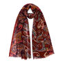 A lightweight woollen scarf with a paisley pattern in mixed reds