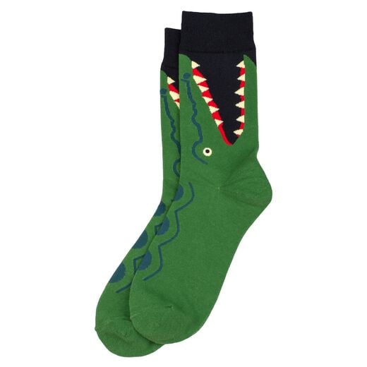 A pair of socks with a playful print of a green crocodile head snapping at the ankles.