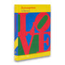 A hardback book featuring with the word 'love' in bright red capital letters on a yellow, green and blue background.