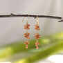 Orange garnet grape hook earrings by Mounir