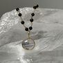 Rutilated quartz and black onyx rosary necklace by Mirabelle