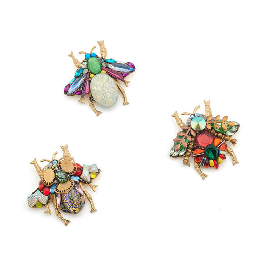 Selection of bejewelled bee brooches, showing the artist's variations