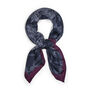 A looped navy blue scarf with a print featuring an intricate illustration of jewellery items.