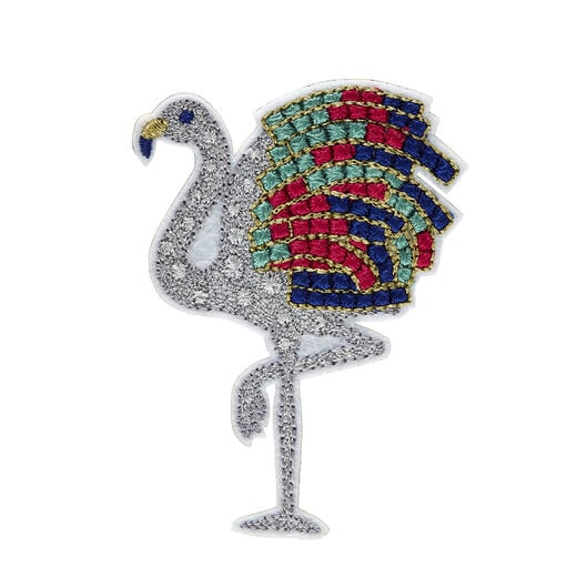 The likeness of a diamond and gemstone Flamingo, hand-sewn in silver, red, green and blue threads 
