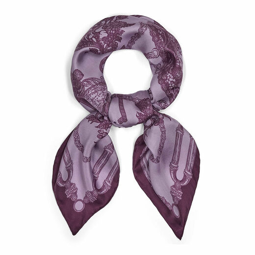 A looped purple scarf with a print featuring an intricate illustration of jewellery items.