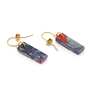 Two hook earrings featuring a rectangular pendant in a marbled multicoloured pattern are laid out on a white background.