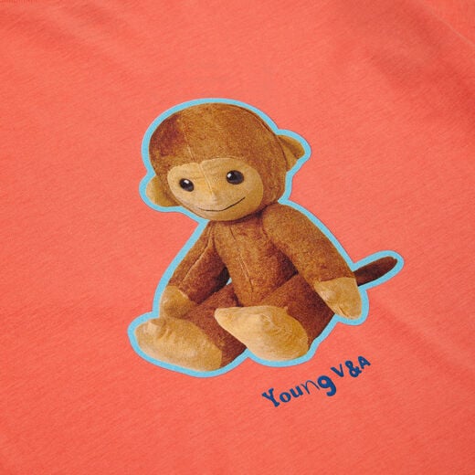 Close up of the soft monkey toy, held in the V&A museum collection.