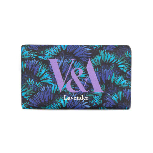 A bar soap wrapped in blue and purple paper, featuring the V&A logo.