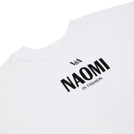 The back collar of a white t-shirt, bearing the text NAOMI In Fashion printed in black. 