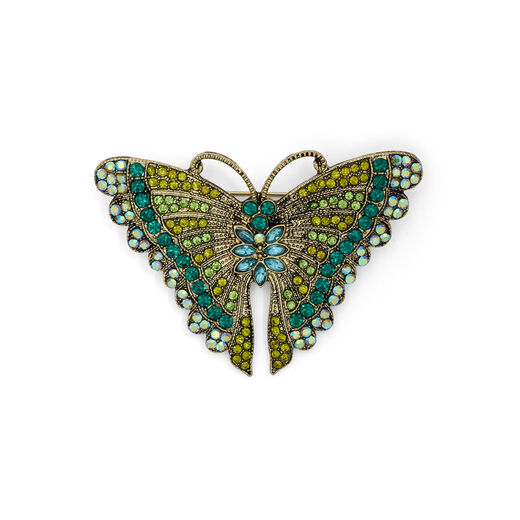 Butterfly-shaped brooch with iridescent crystal accents.