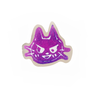 A purple sticker with metallic foil edges in the shape of a cat's face.