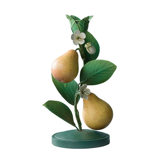 A candlestick in the shape of a pear branch with green leaves and two pears.