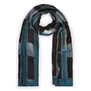 A blue and black scarf wrapped up on a white background.