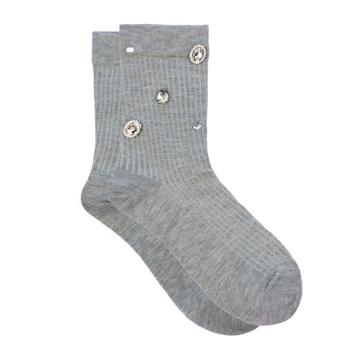 A pair of grey socks embellished with rhinestones.