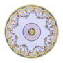 A round plate featuring a pink, lilac and gold pattern inspired by 18th century French porcelain.
