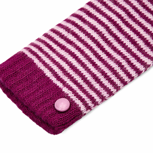 A detail shot of a striped pink glove.
