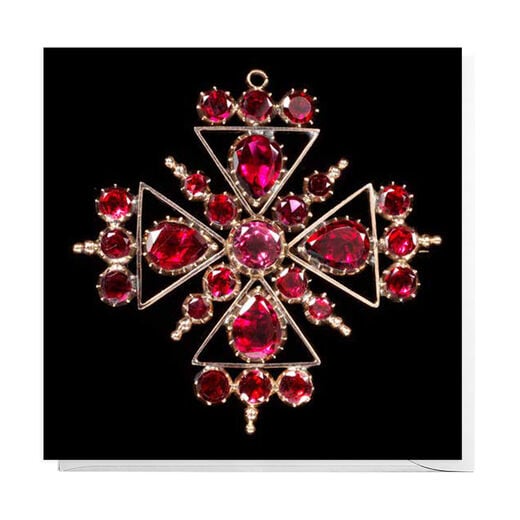 Pack of 8 Christmas cards featuring the caption of a ruby pendant cross from the V&A collection