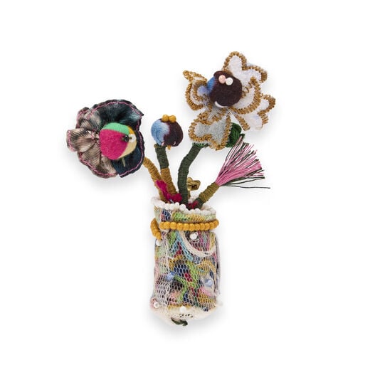 Recycled textile and embroidered brooch featuring tiny flowers in a vase