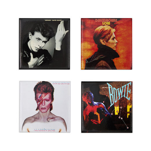 Set of six David Bowie guitar picks featuring iconic portraits from different albums