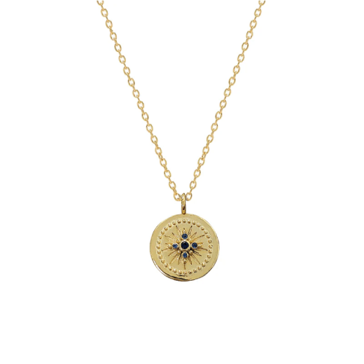 A gold chain necklace with a round gold pendant.