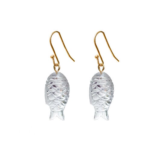 A pair of gold hook earrings featuring a clear crystal stone carved in the shape of a fish.