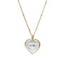 Gold chain necklace with a heart shaped pendant carved out of a clear crystal.