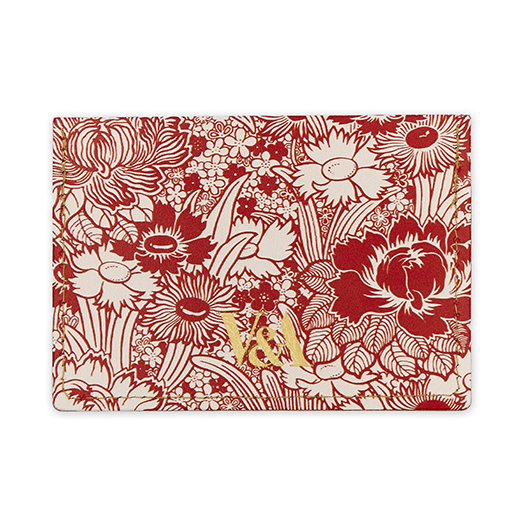 Leather cardholder featuring a red and white floral pattern and the V&A logo in gold foiled letters.