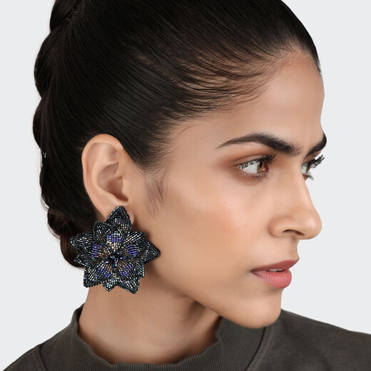 Floral beadwork earrings by Olivia Dar