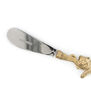 A detail of the tip of a butter knife.