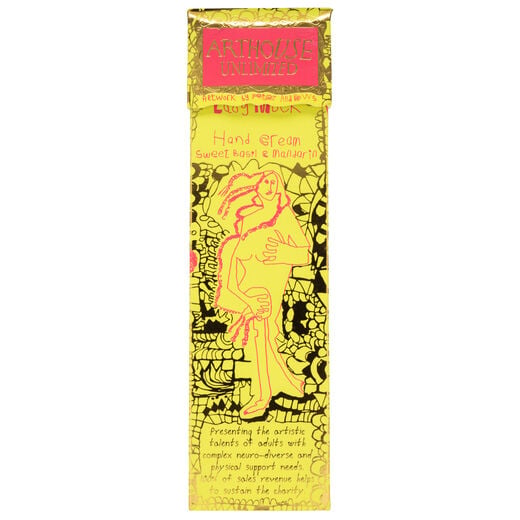 A bright yellow hand cream paper box featuring an artwork by ARTHOUSE Unlimited artist Peter Andrews.