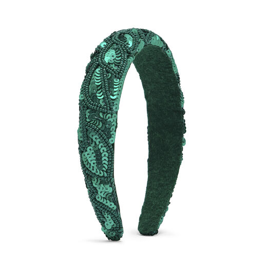 A sparkly cotton green headband, embellished with green sequins.
