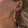 Leaves pull-through hoop earrings by Ottoman Hands