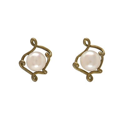 Pearl stud earrings by Michael Michaud
